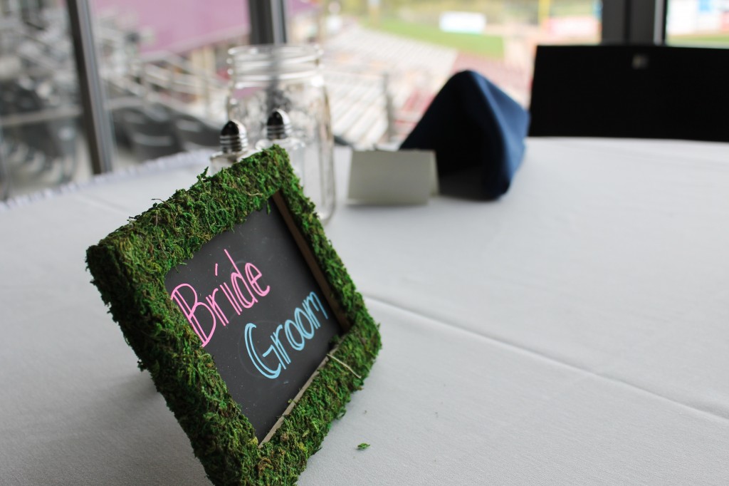 bride and groom sign