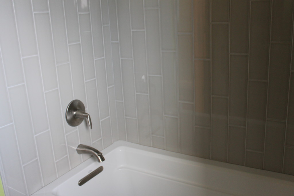 tile tub surround flooring trends shower showers right gray vertical tiles katiejaneinteriors bathtub subway bathroom vertically installed format grey master