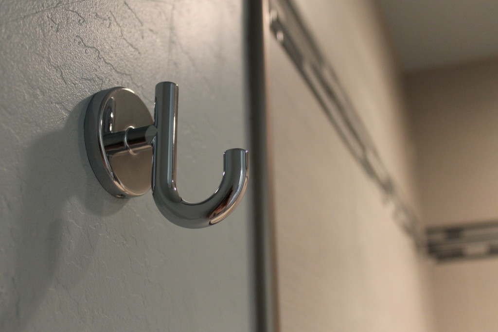 tile shower close-up on hooks