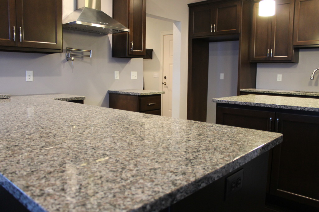 grey granite with espresso cabinets2