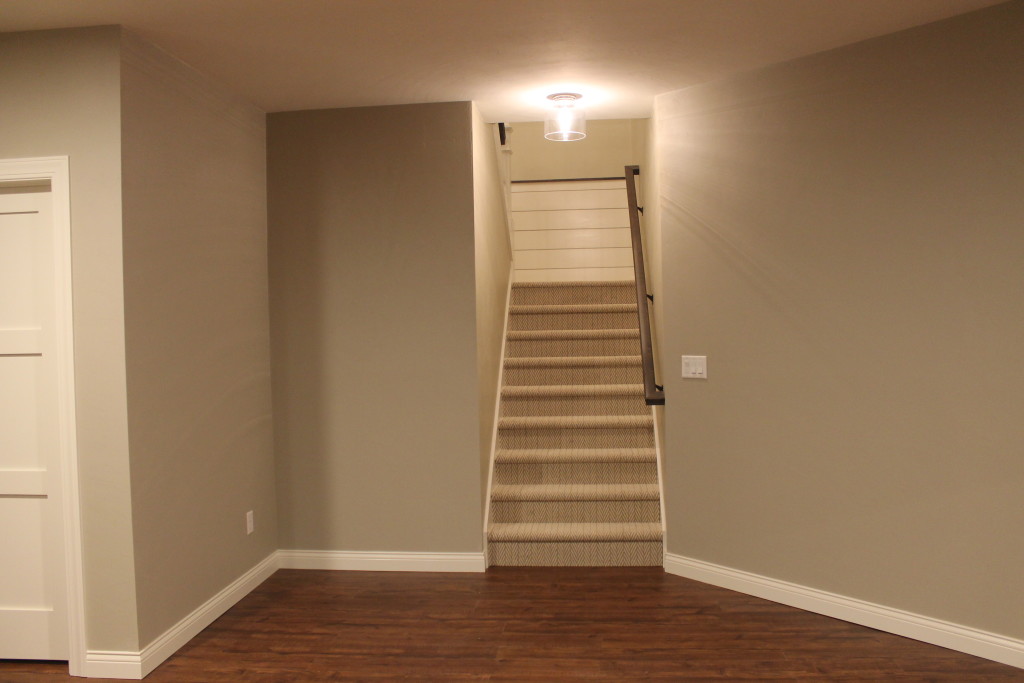 shiplap detail on stairs from lower level (1)