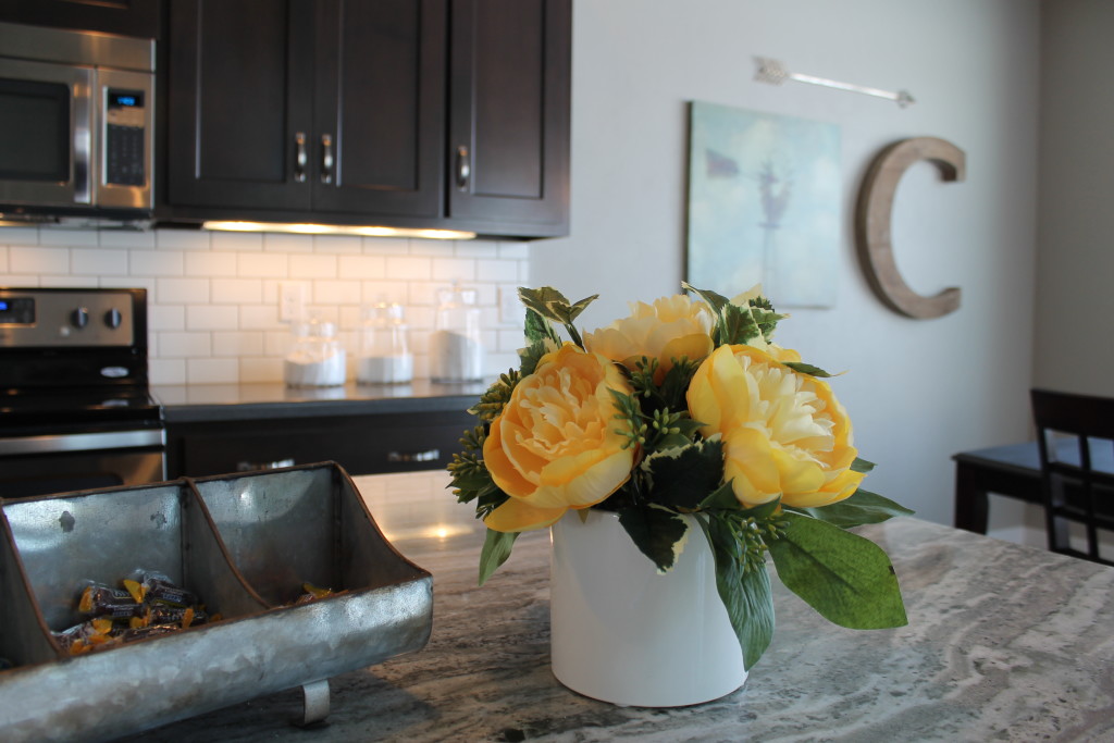 yellow roses on kitchen island