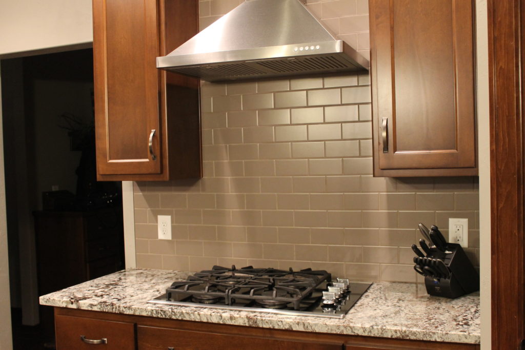 grey tile backsplash at Millers