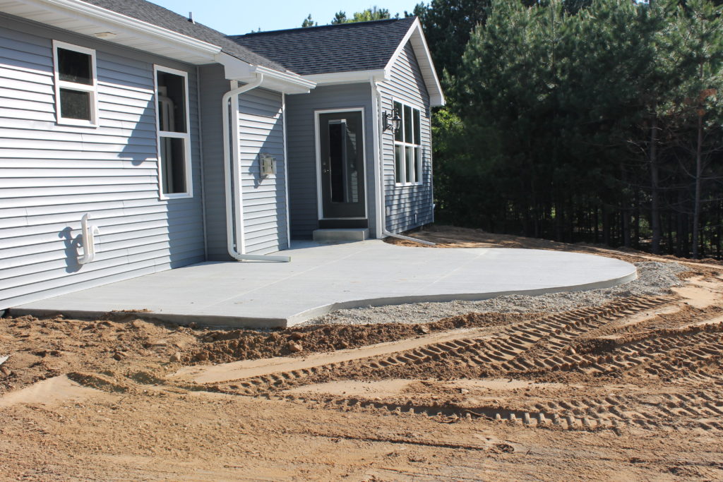 millers backyard with curved patio