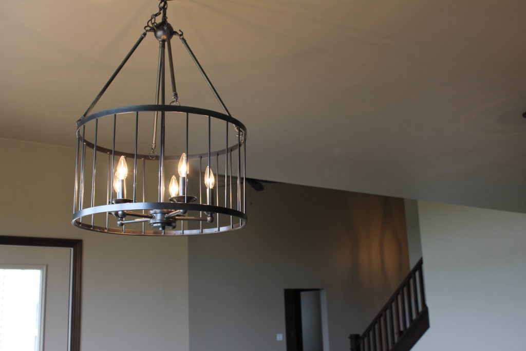 round cage light in dining nook