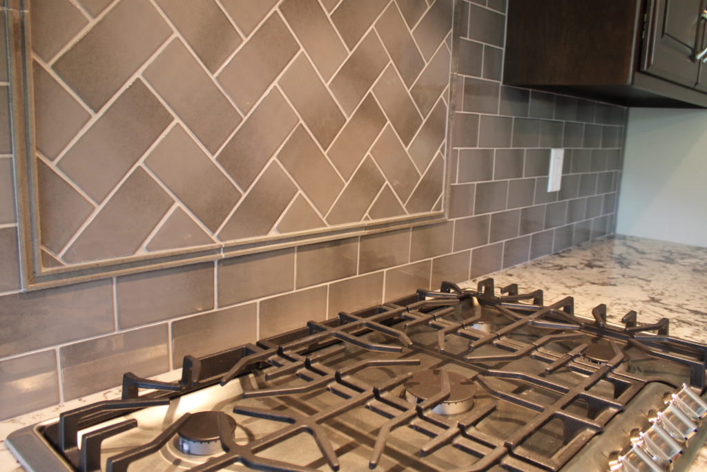 backsplash tile herringbone pattern with pencil tile