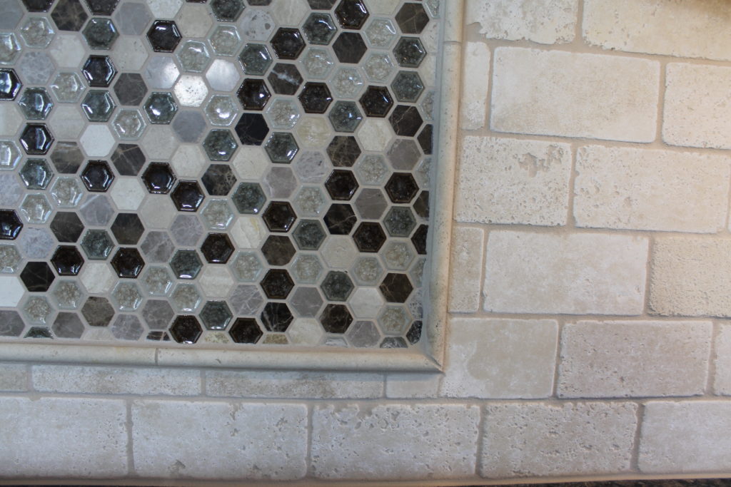 close-up on dake octagon backsplash tile with border