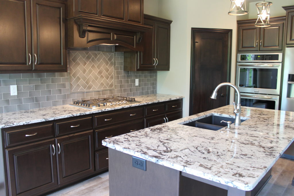 custom spruce kitchen with sink in island