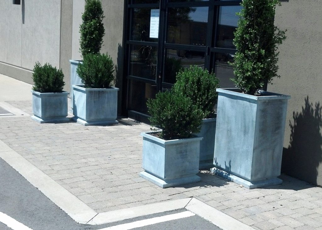 galvanized exterior pots at august haven in green bay