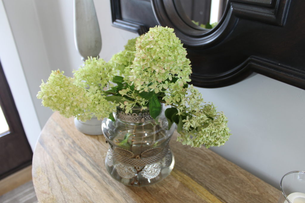 fresh flowers on your entrance table