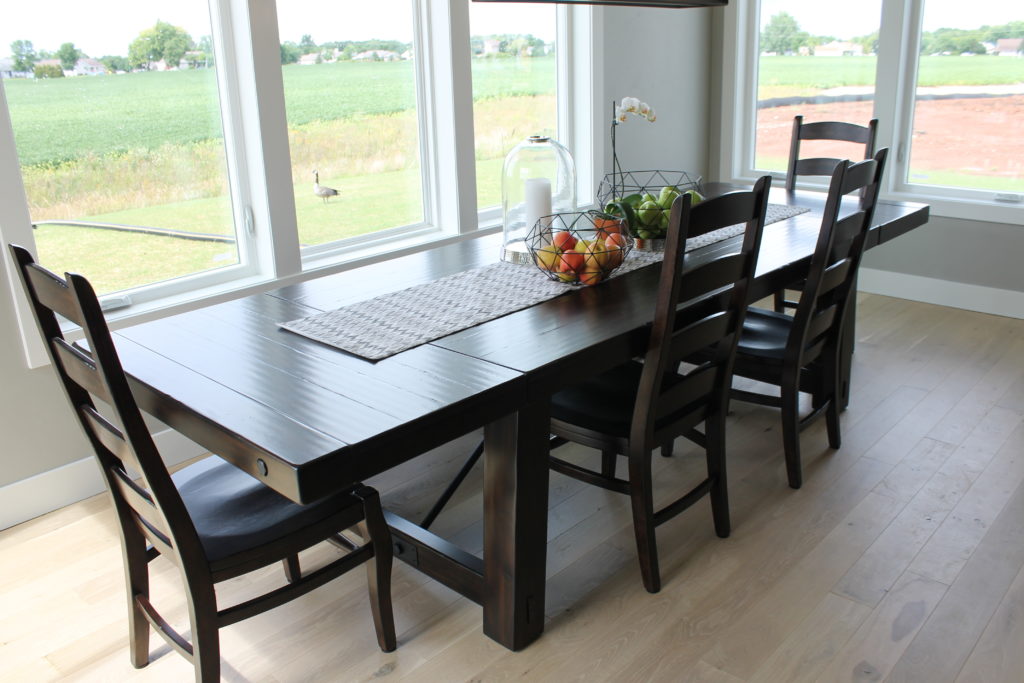 light colored hardwood floors at summer parade house