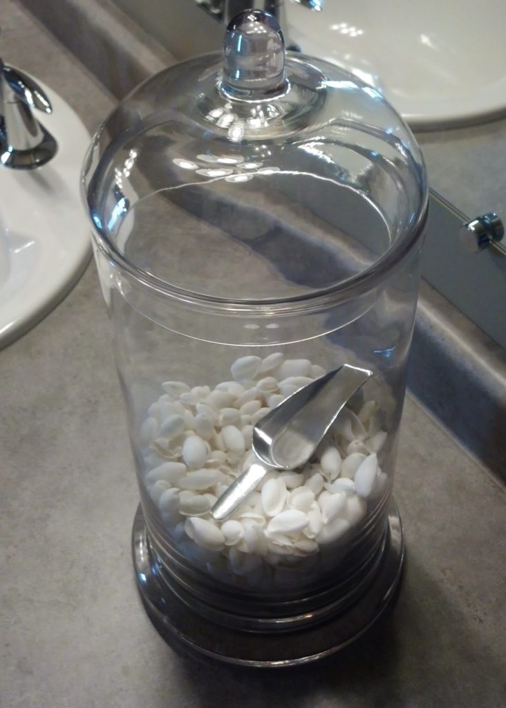 seashells in bathroom jar