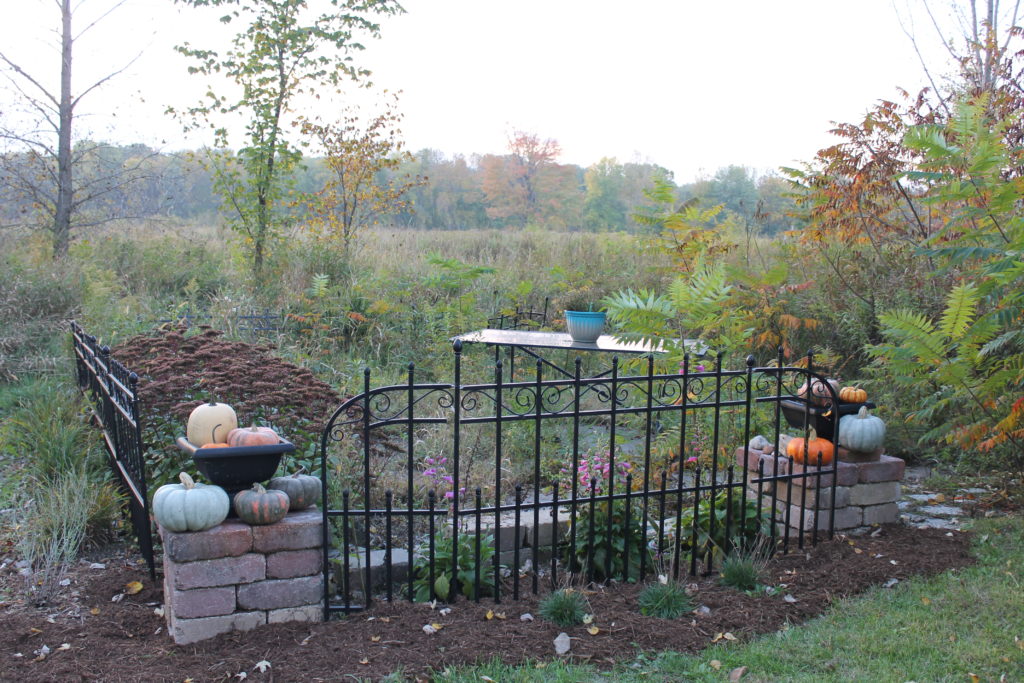 machine-shed-patio-with-blue-and-orange-pumpkins-fall-2016