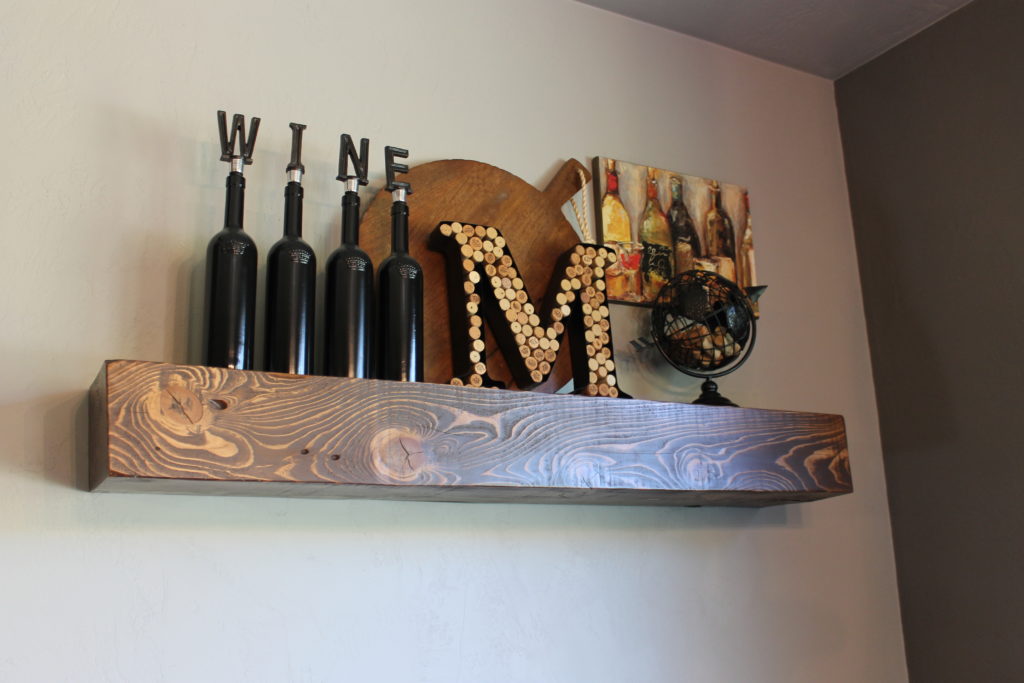 shelf-with-wine-corks-and-monogram
